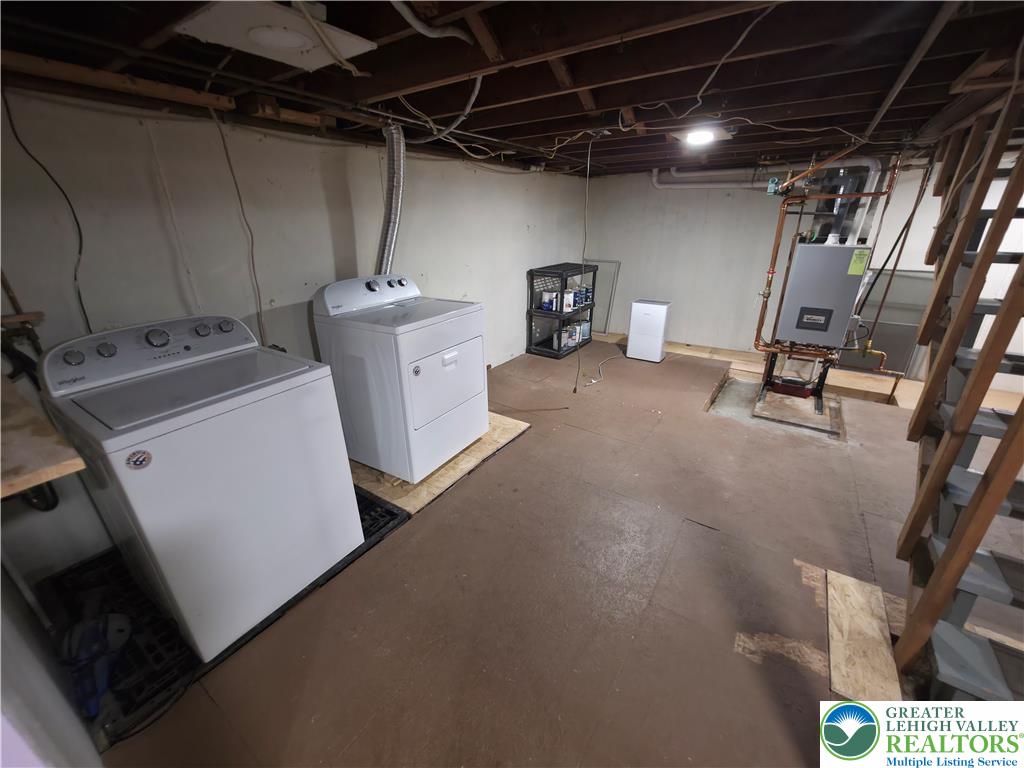 719 Keystone Avenue Bethlehem, PA 18018 - Photo 22 of 32 Functional basement space provides essential laundry amenities and utility access.