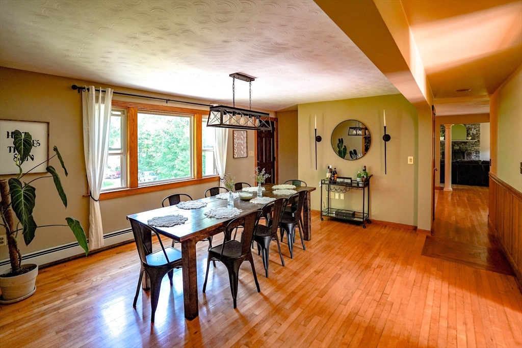 117 Main Street Rutland, MA 01543 - Photo 14 of 35 a view of a dining room with furniture window and wooden floor