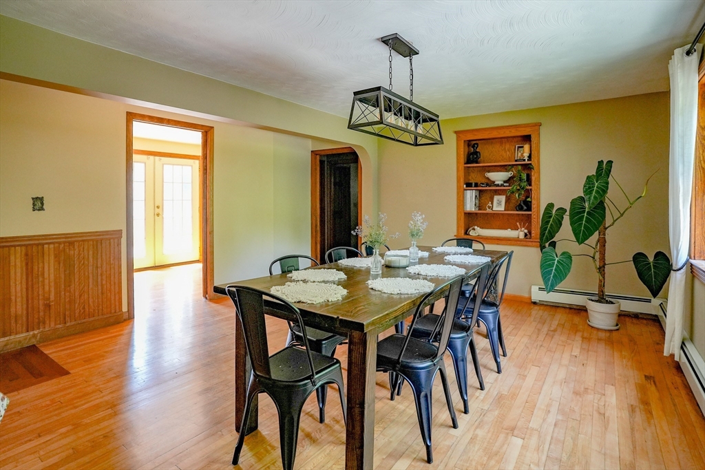 117 Main Street Rutland, MA 01543 - Photo 15 of 35 a view of a dining room with furniture window and wooden floor