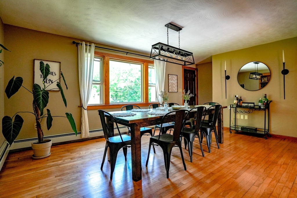 117 Main Street Rutland, MA 01543 - Photo 16 of 35 a view of a dining room with furniture window and wooden floor