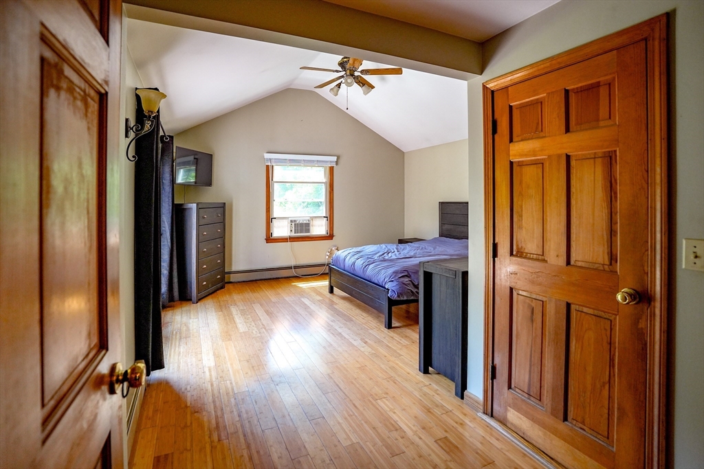 117 Main Street Rutland, MA 01543 - Photo 19 of 35 a view of bedroom with a bed and wooden floor