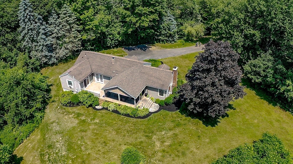 117 Main Street Rutland, MA 01543 - Photo 35 of 35 an aerial view of a house with swimming pool and garden view