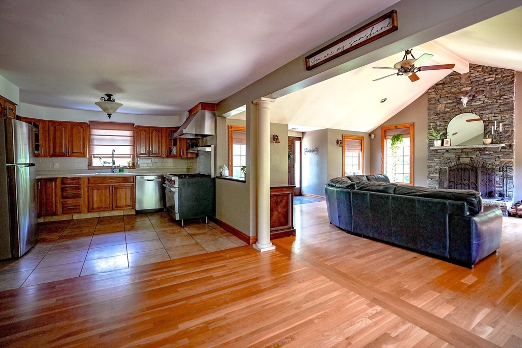 117 Main Street Rutland, MA 01543 - Photo 9 of 35 a view of kitchen with cabinets and wooden floor