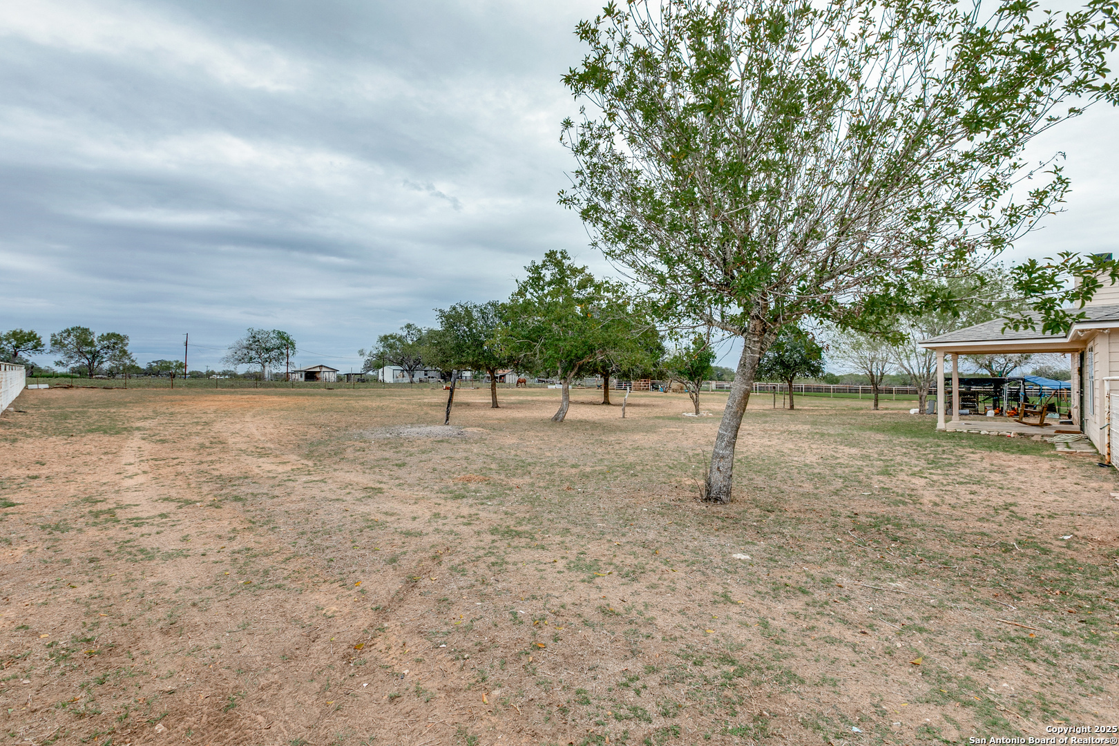 745 Cimarron Square Poteet, TX 78065 - Photo 25 of 33 a view of a park with large trees