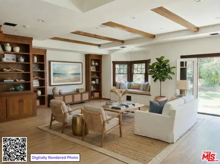 a living room with fireplace furniture and a large window