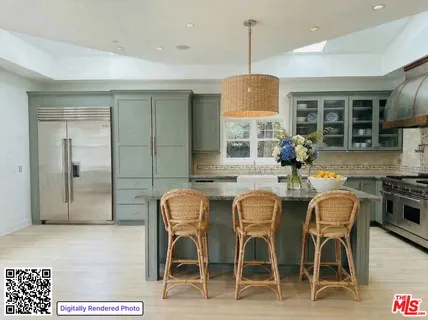 a kitchen with granite countertop a stove a table and chairs in it