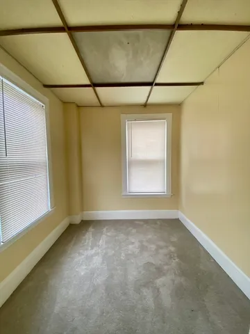 a view of a window in an empty room