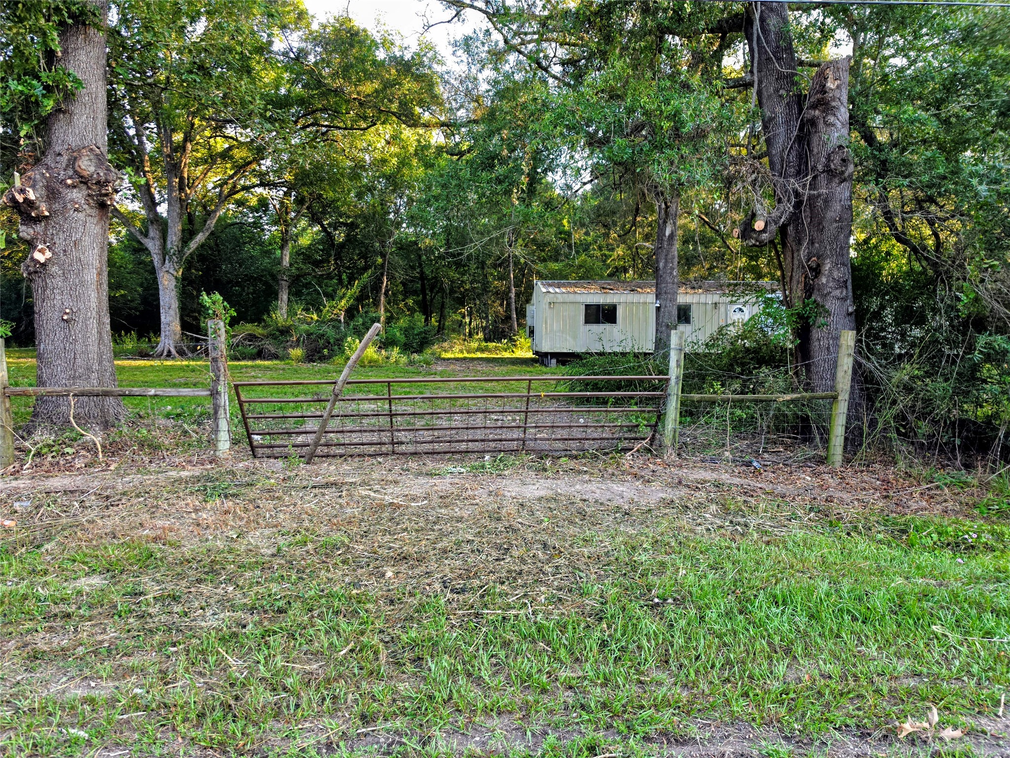 Tbd 3rd Street Batson, TX 77519 - Photo 6 of 20 Current view from 3rd St. looking at the home. New gate coming soon.
