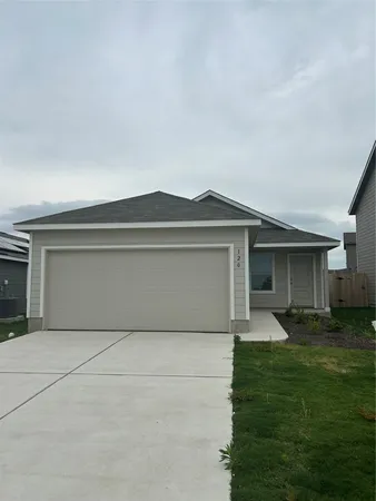 a front view of house with yard