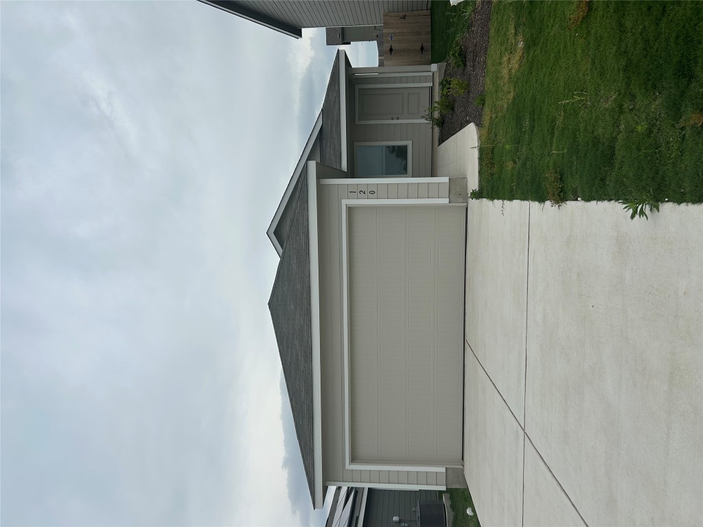 120 Cattle Queen Road Jarrell, TX 76537 - Photo 1 of 9 a front view of house with yard
