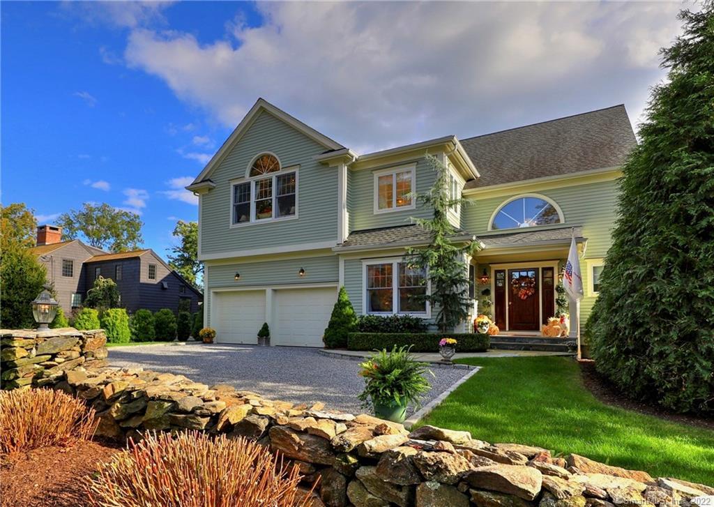 Stunning custom stone walls and stately stone pillars welcome you home.