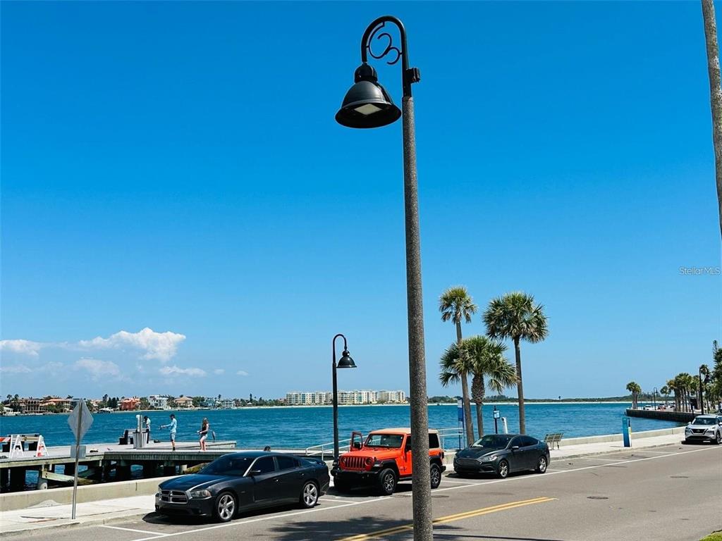 702 Pass A Grille Way St. Pete Beach, FL 33706 - Photo 16 of 41 a view of a parking area