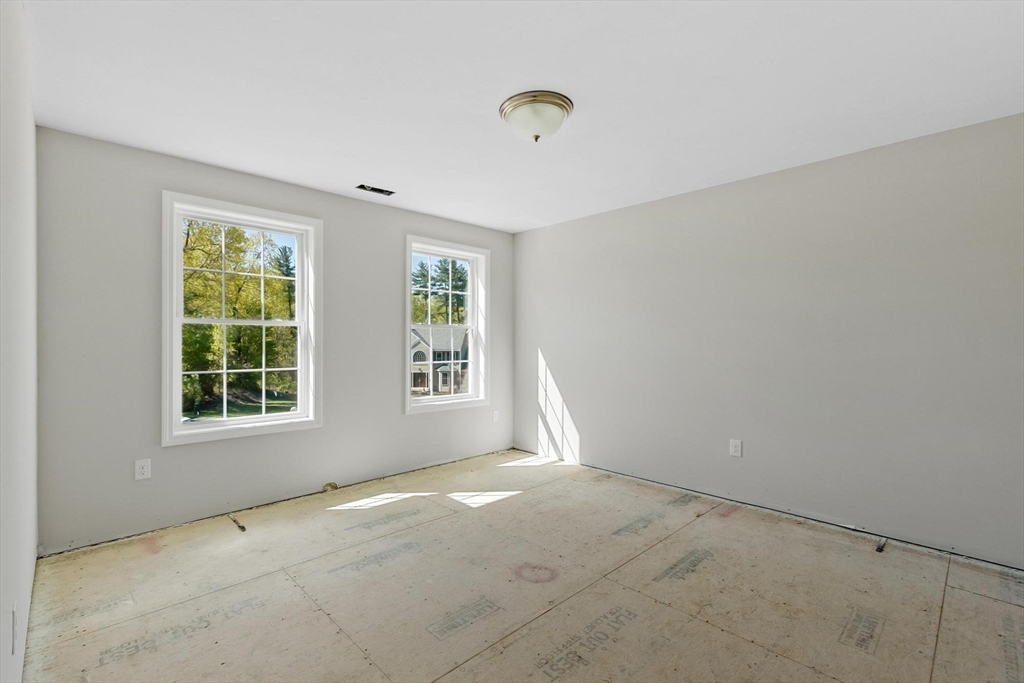 22 Benoit Avenue Pelham, NH 03076 - Photo 33 of 42 a view of an empty room with a window