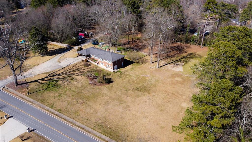 4983 Arcado Road Southwest Lilburn, GA 30047 - Photo 6 of 33 a view of a backyard of the house