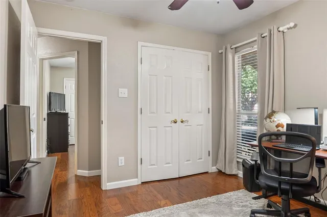 a room with furniture and wooden floor