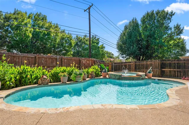 a view of a garden with a bench