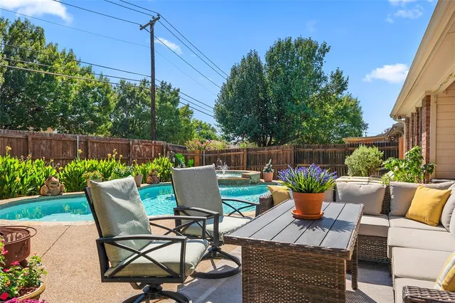 a view of a table and chairs in patio