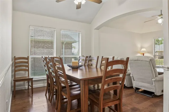 a view of a dining room with furniture