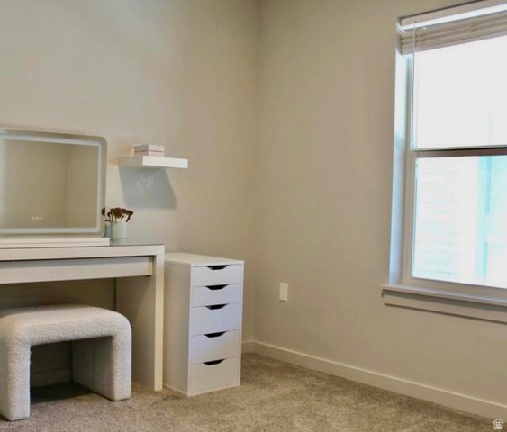 64 West 600 South, Unit C105 Springville, UT 84663 - Photo 10 of 11 Carpeted room with a window featuring blinds and a white sill