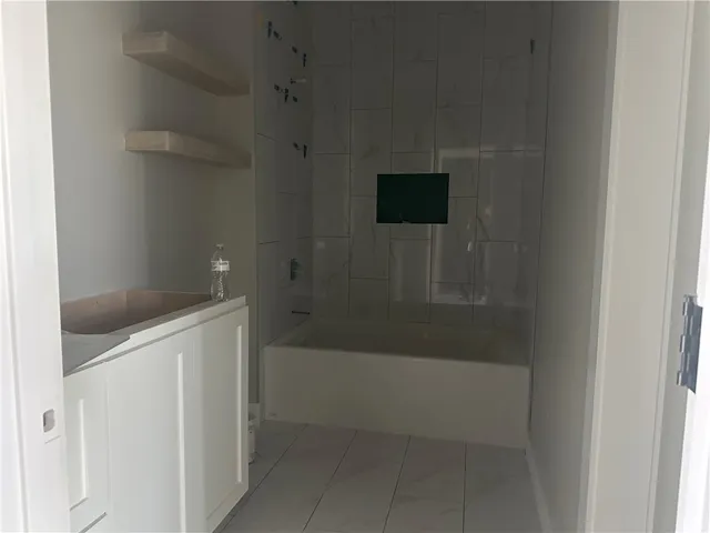 a bathroom with a bathtub