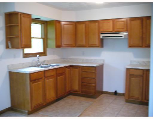 141 Limerick Road Herminie, PA 15637 - Photo 5 of 8 Kitchen. Sunny kitchen workspace.