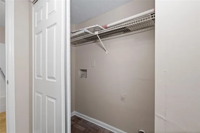 a view of a room with rack on the wall
