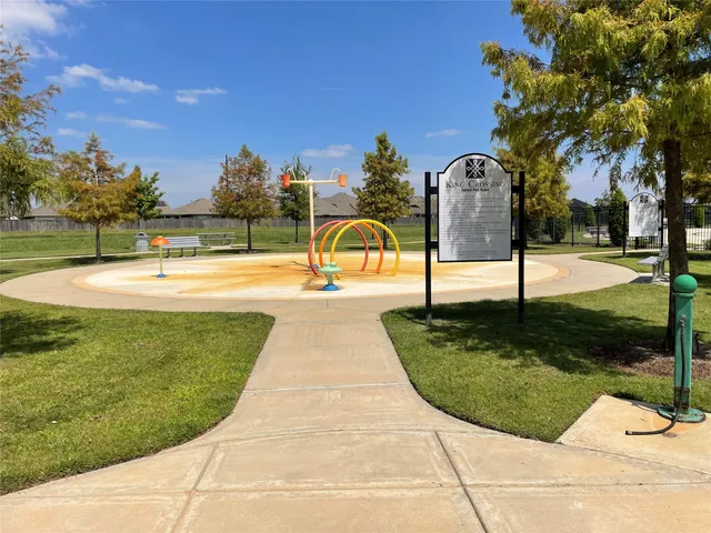 a view of a park with swings