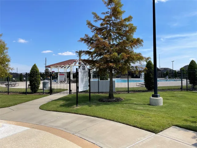 a view of a park with swings
