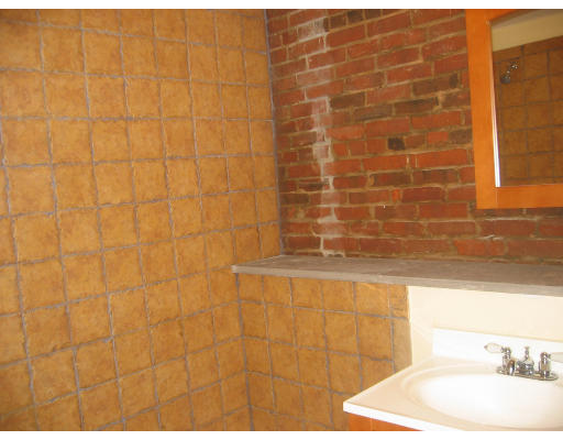 19 Emerson Street, Unit 1 Boston, MA 02127 - Photo 13 of 14 a bathroom with a bathtub and a sink