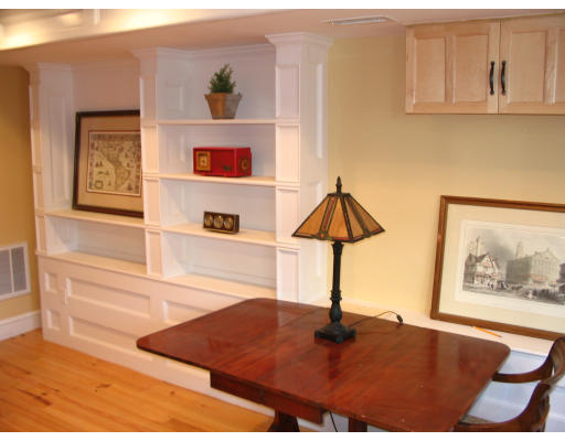 19 Emerson Street, Unit 1 Boston, MA 02127 - Photo 2 of 14 a picture of a room with a painting on the wall