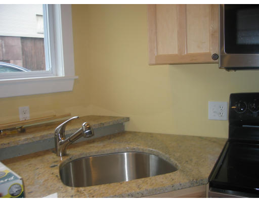 19 Emerson Street, Unit 1 Boston, MA 02127 - Photo 5 of 14 a close view of sink and tap