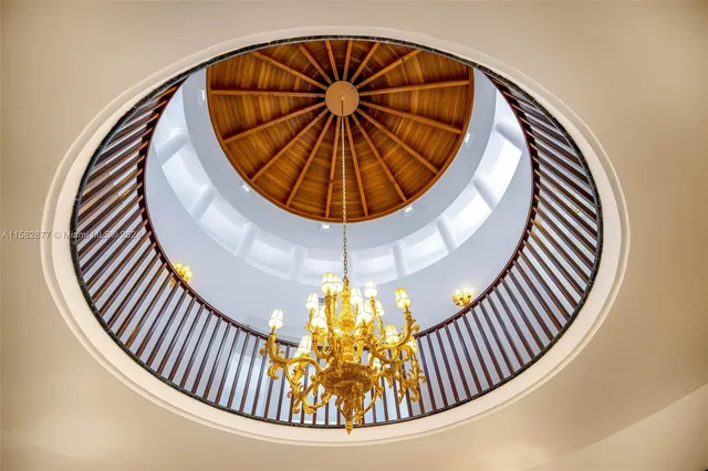 a view of an entryway door with a staircase