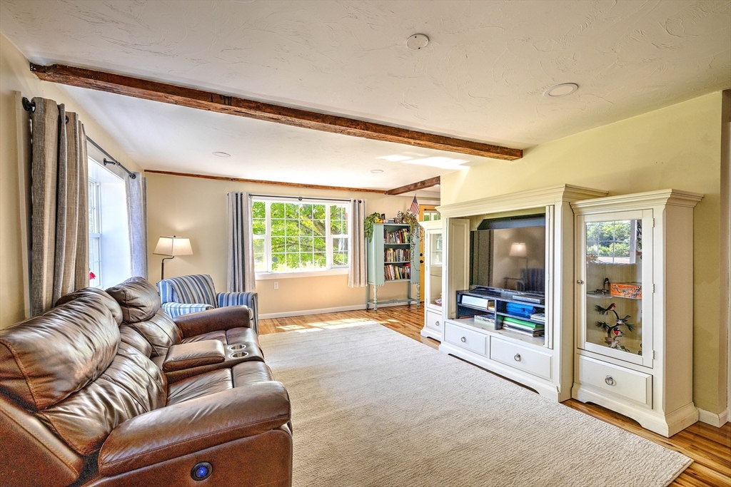 43 Rufus Putnam Road North Brookfield, MA 01535 - Photo 11 of 42 a living room with furniture and a large window