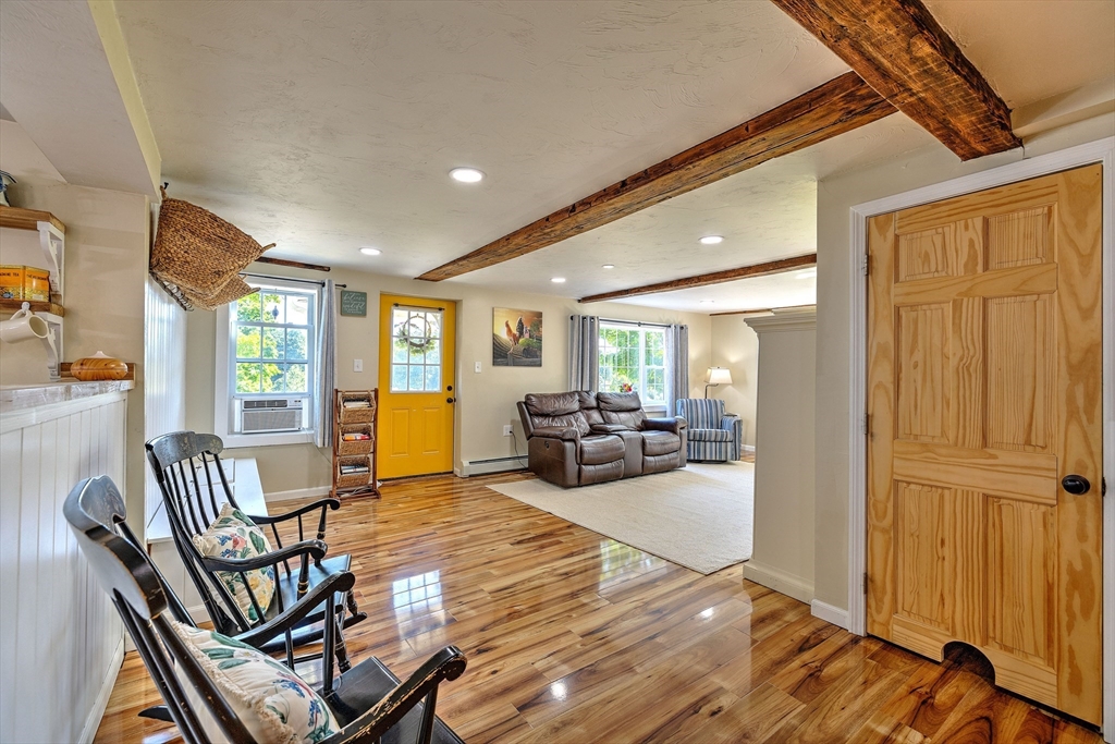 43 Rufus Putnam Road North Brookfield, MA 01535 - Photo 14 of 42 a living room with furniture a wooden floor and next to a window