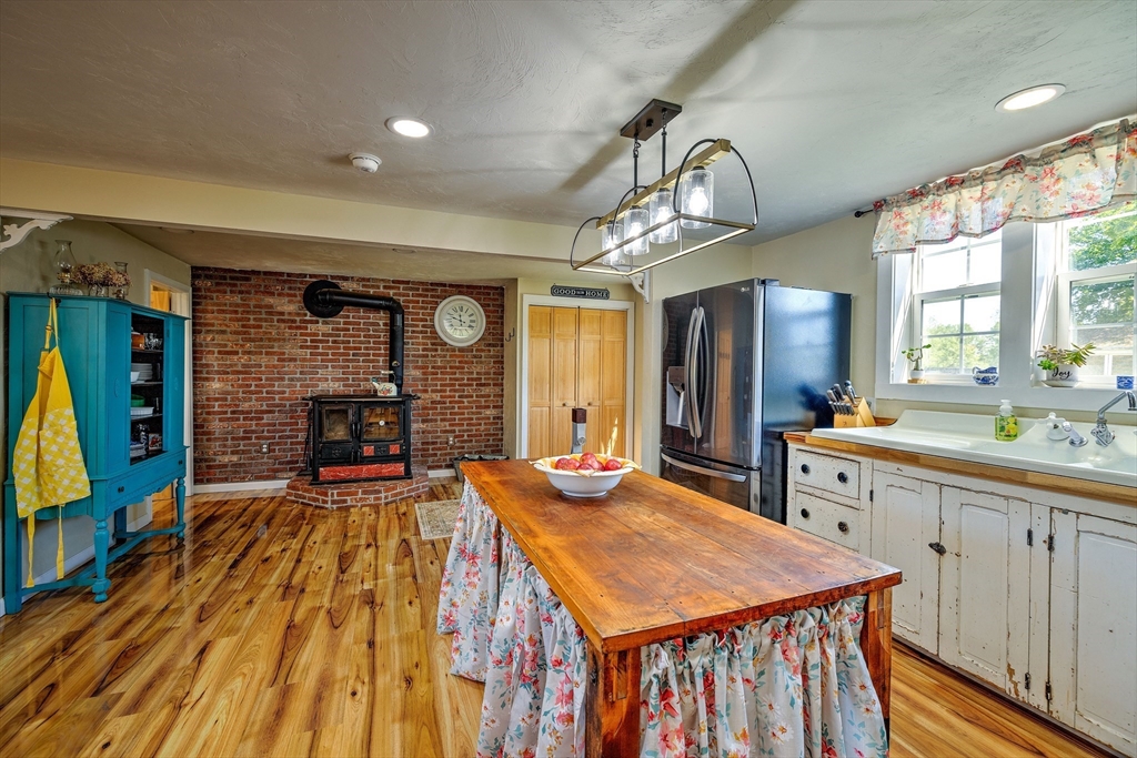 43 Rufus Putnam Road North Brookfield, MA 01535 - Photo 18 of 42 a dining hall with stainless steel appliances granite countertop a stove and a refrigerator