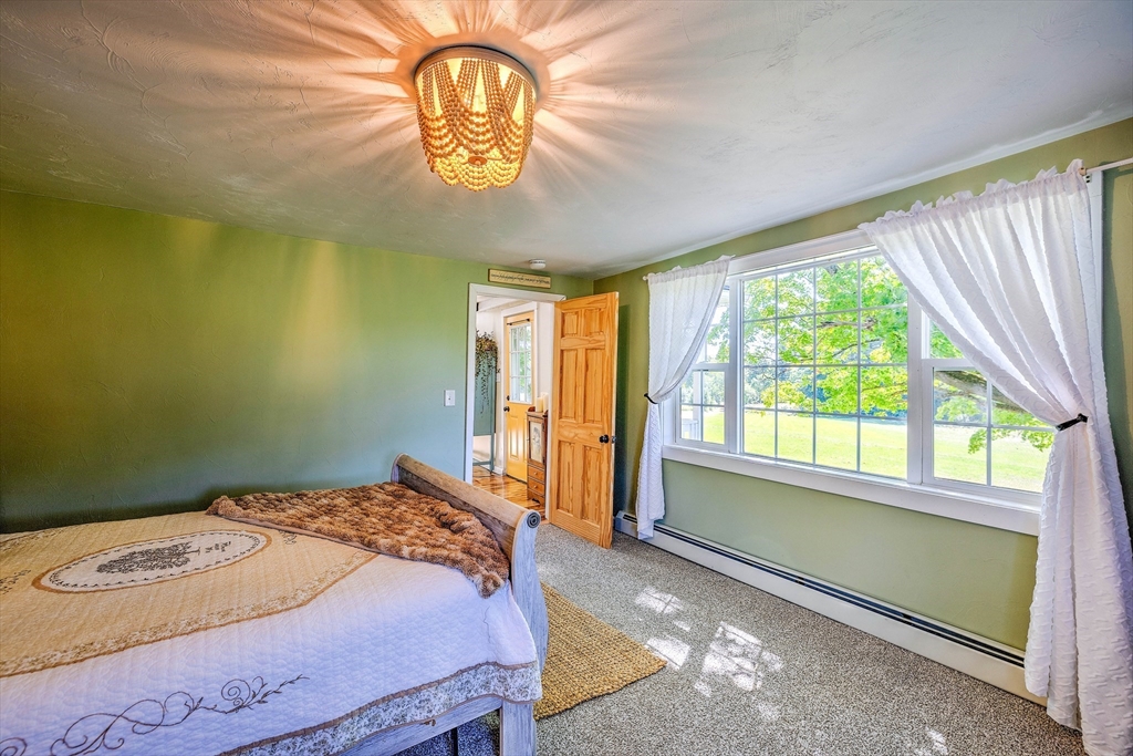 43 Rufus Putnam Road North Brookfield, MA 01535 - Photo 22 of 42 a bedroom with a bed and a window