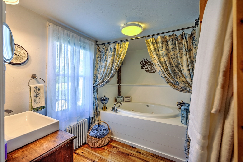 43 Rufus Putnam Road North Brookfield, MA 01535 - Photo 23 of 42 a bathroom with a sink and a bathtub