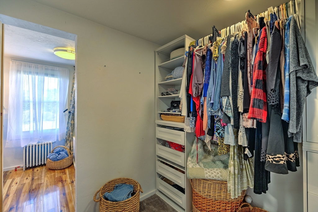43 Rufus Putnam Road North Brookfield, MA 01535 - Photo 25 of 42 a view of walk in closet with clothes and shoes
