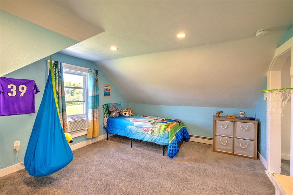 43 Rufus Putnam Road North Brookfield, MA 01535 - Photo 36 of 42 a room with toys and a flat screen tv