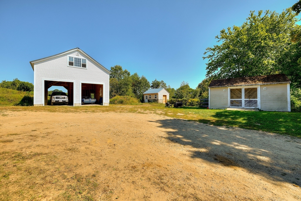 43 Rufus Putnam Road North Brookfield, MA 01535 - Photo 5 of 42 a view of a white house with a yard