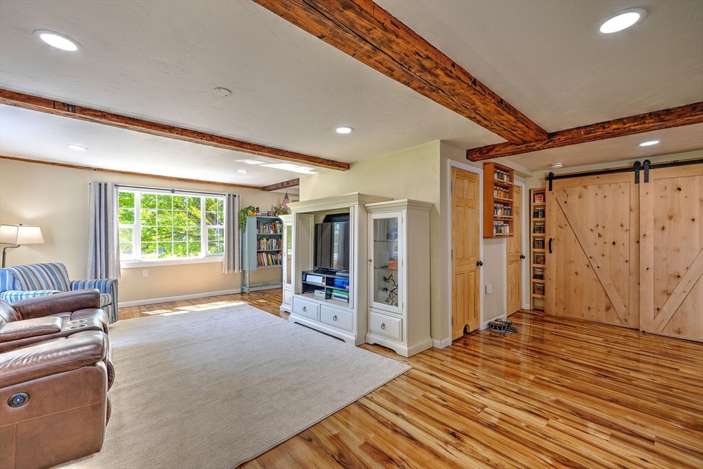 43 Rufus Putnam Road North Brookfield, MA 01535 - Photo 10 of 42 a room with wooden floor and furniture