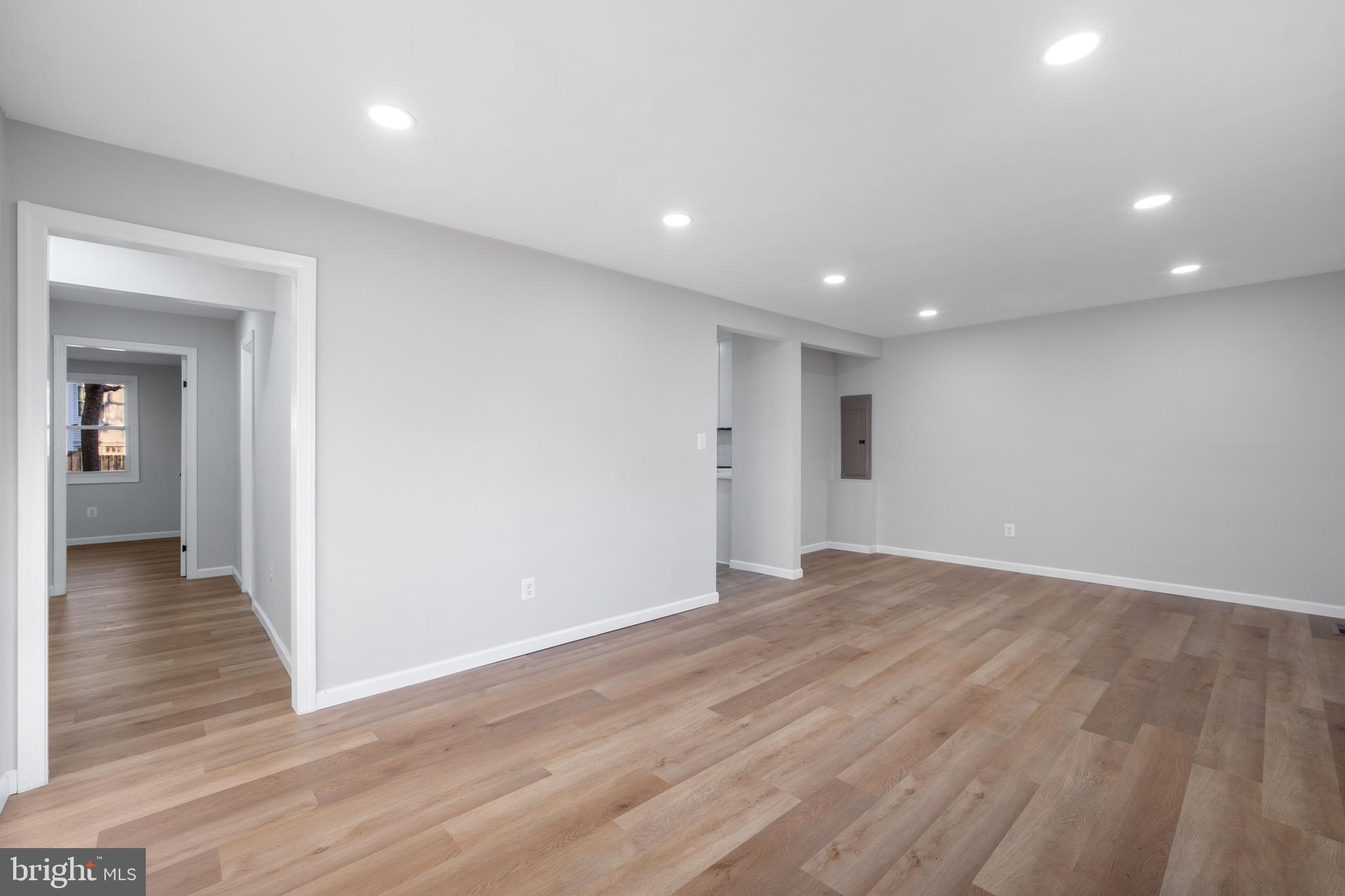 497 Bruce Avenue Odenton, MD 21113 - Photo 11 of 38 a view of an empty room with wooden floor