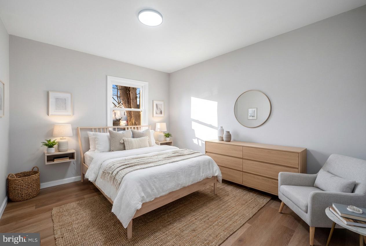 497 Bruce Avenue Odenton, MD 21113 - Photo 27 of 38 a bedroom with bed and window