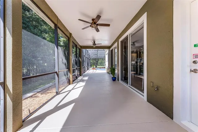 a view of a swimming pool with a porch