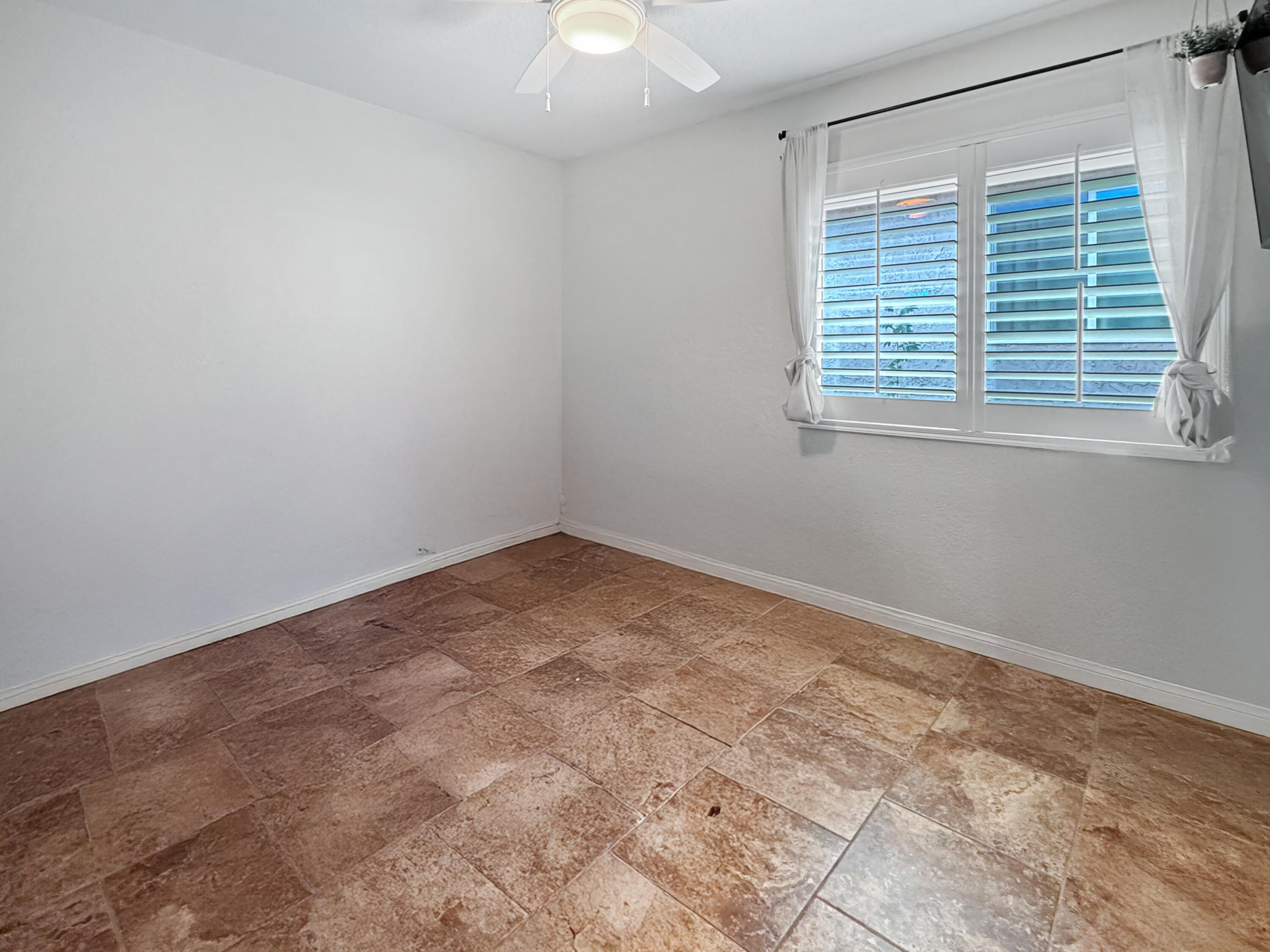 53845 Avenida Herrera La Quinta, CA 92253 - Photo 22 of 25 an empty room with a window