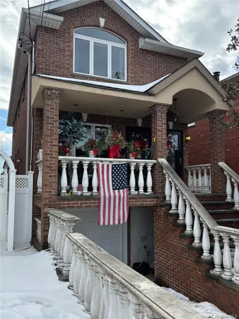 a view of a house with wooden deck