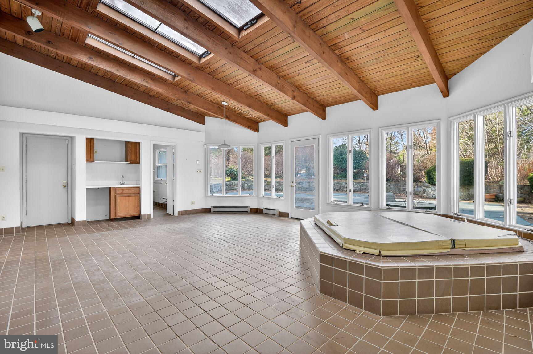 10816 Fox Hunt Lane Potomac, MD 20854 - Photo 12 of 26 Beamed Ceilings and Indoor Hot Tub