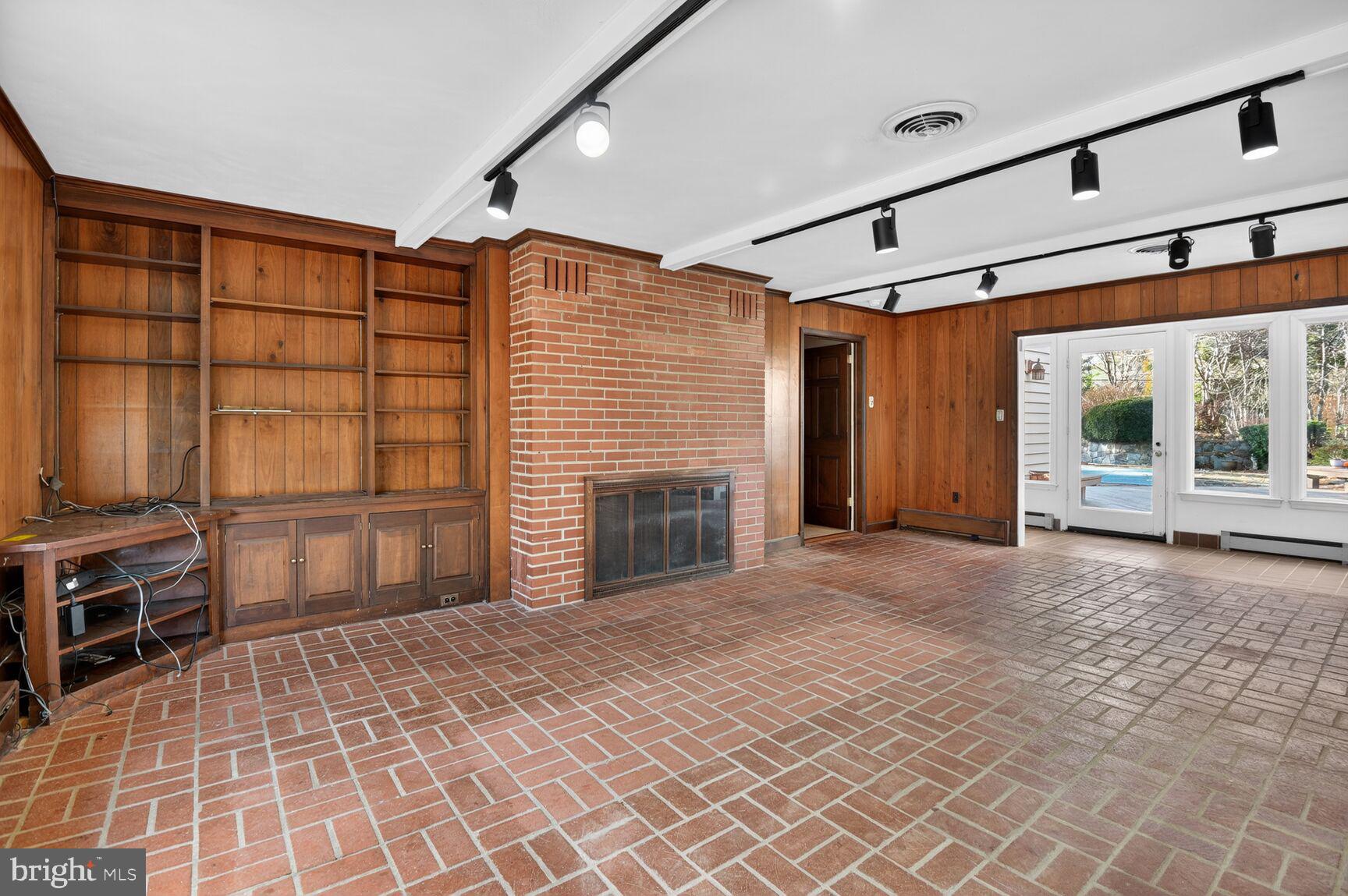 10816 Fox Hunt Lane Potomac, MD 20854 - Photo 10 of 26 Family Room with Brick Floor