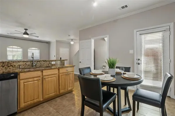 a view of a kitchen with a stove cabinets and wooden floor