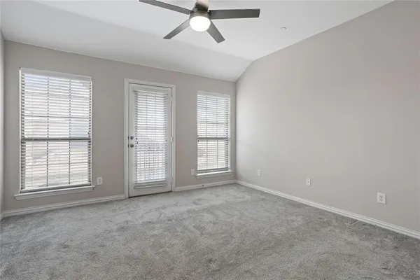 a view of a room that has a window in it